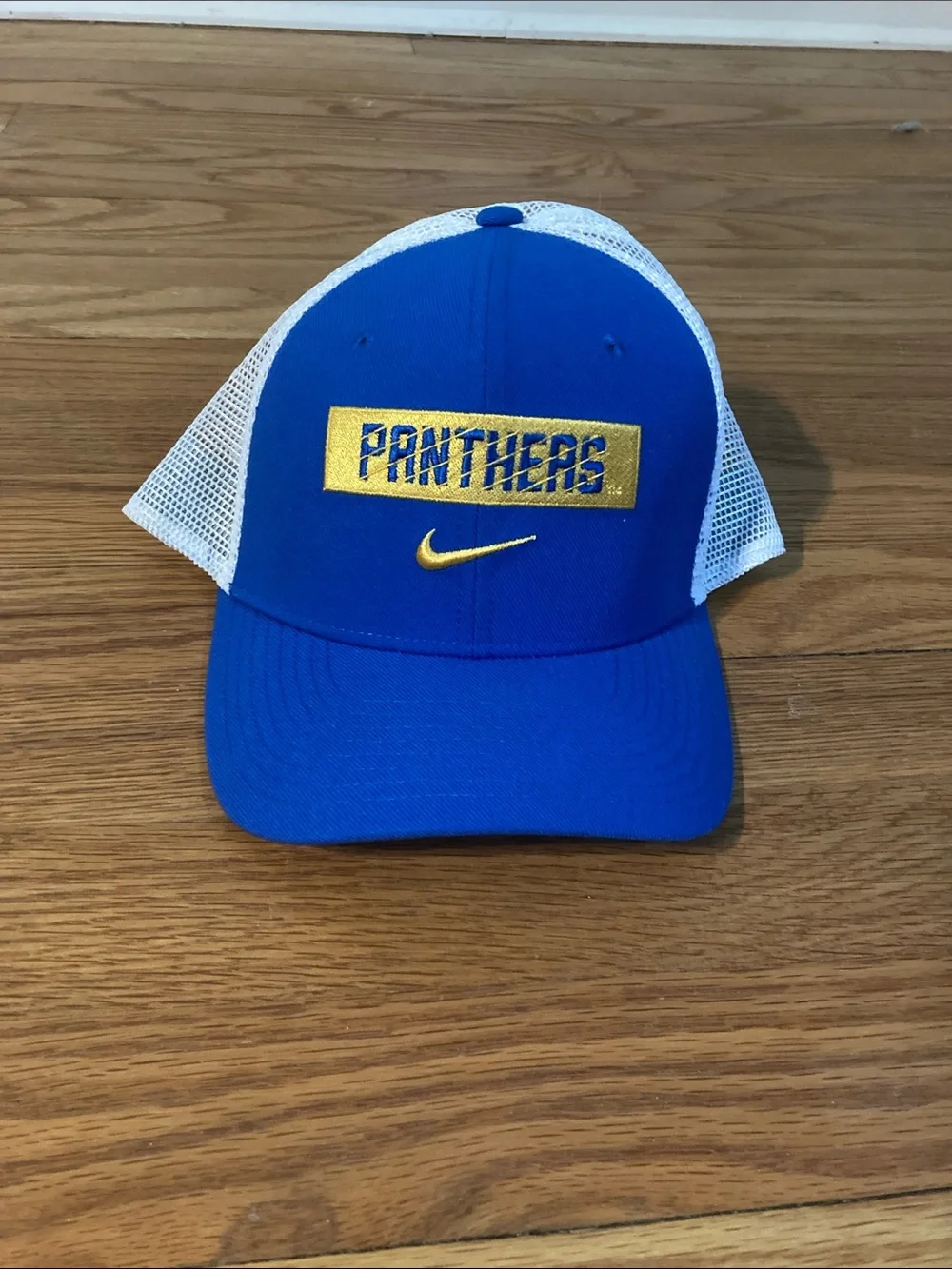 Nike Royal Blue and White Panthers Trucker Hat with Gold Accents